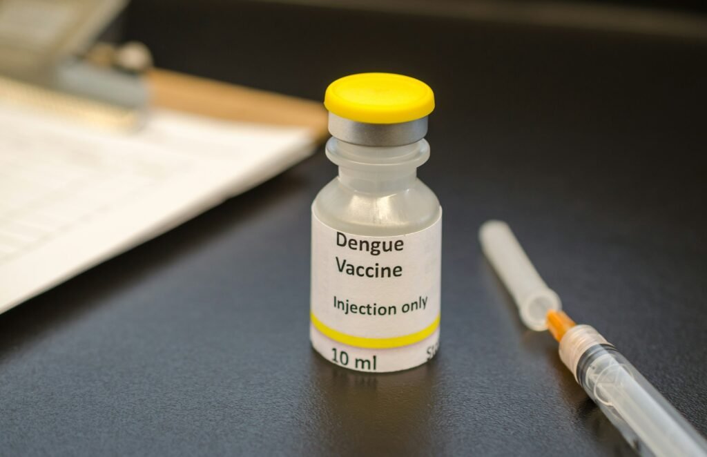 Dengue virus vaccine vial with syringe