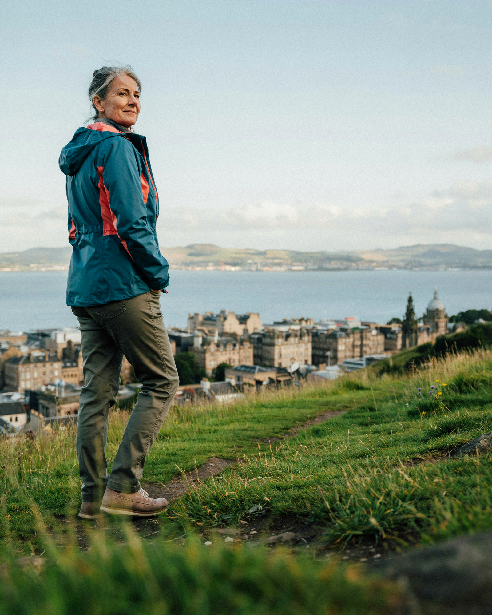Woman walking along Bruntsfield Place in Edinburgh after booking a Mounjaro consultation at Edinburgh Vaccination Clinic
