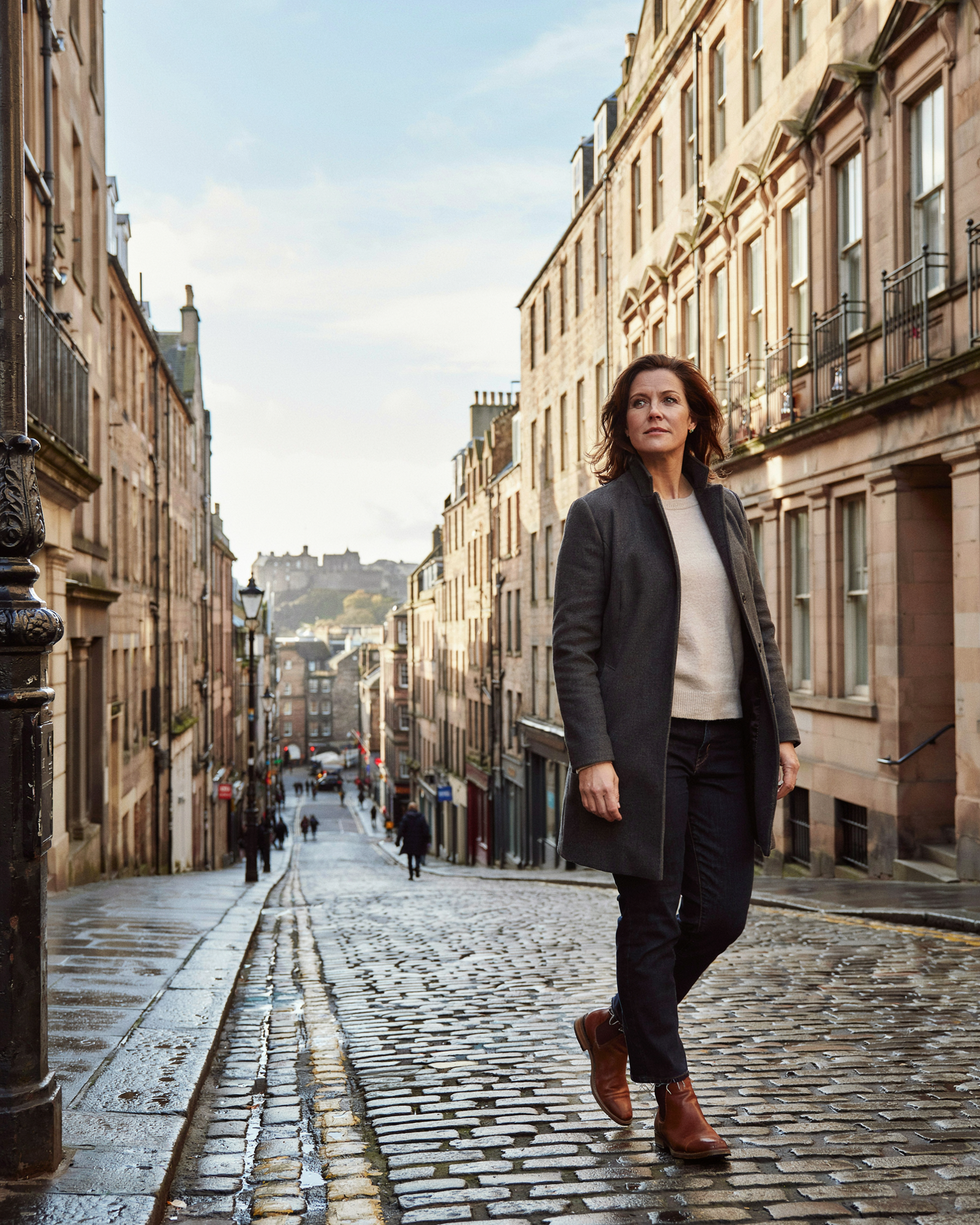 Woman pausing on Calton Hill in Edinburgh, looking out over the city — Mounjaro dose guide at Edinburgh Vaccination Clinic, Bruntsfield