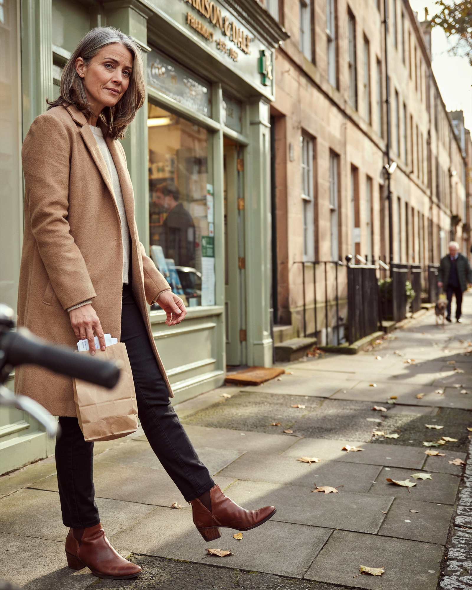 Woman leaving Edinburgh Vaccination Clinic with Mounjaro prescription, no GP referral required