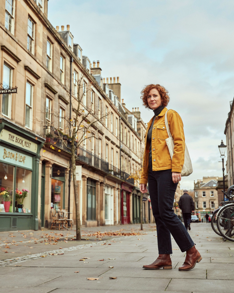 Person walking along Bruntsfield Place in Edinburgh on a crisp morning