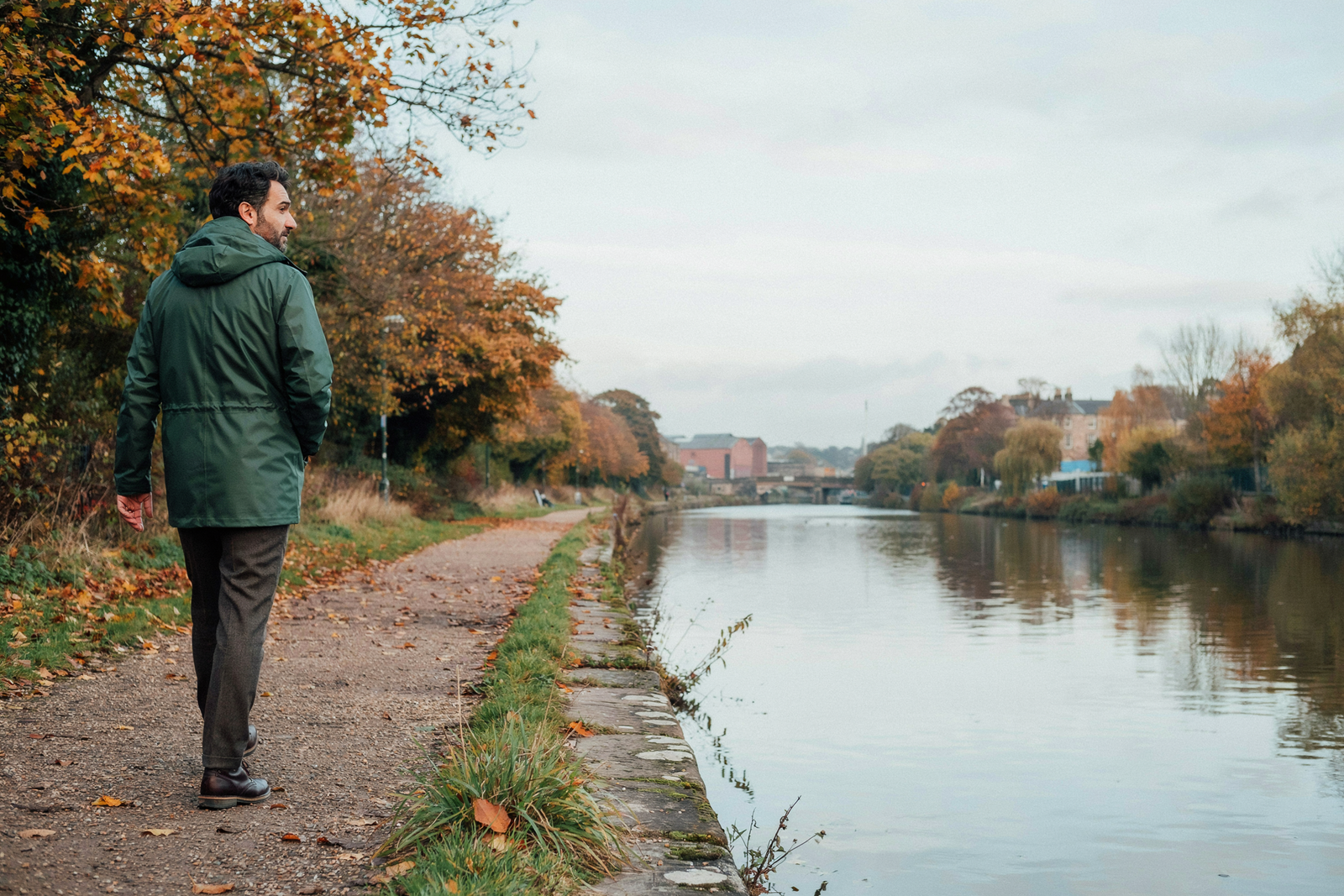 Person walking along the Union Canal towpath in Edinburgh