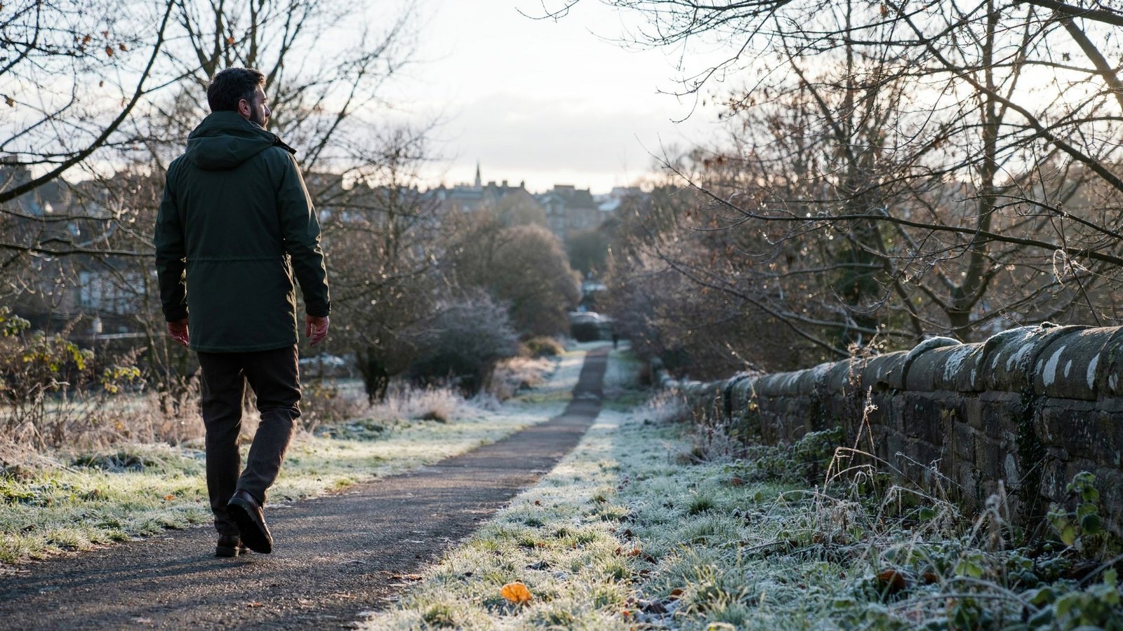 Types of COVID vaccine Edinburgh - frosty morning on the Warriston path Adult walking along the Warriston path in Edinburgh on a frosty winter morning, protected by an updated COVID-19 vaccine
